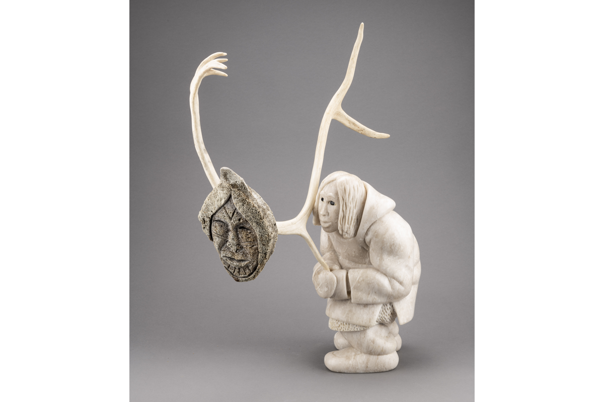 Manasie Akpaliapik, <em>A Young Man Proudly Proclaiming That His Knowledge Comes from Elders and Ancestors</em>, 1997. Alabaster, whalebone, caribou antler, white stone and black African wonderstone, 61,2 x 27 x 47,2 cm. MNBAQ, promised gift of Lyse Burgoyne-Brousseau (DPD.2016.29) © Manasie Akpaliapik Photo: MNBAQ, Idra Labrie