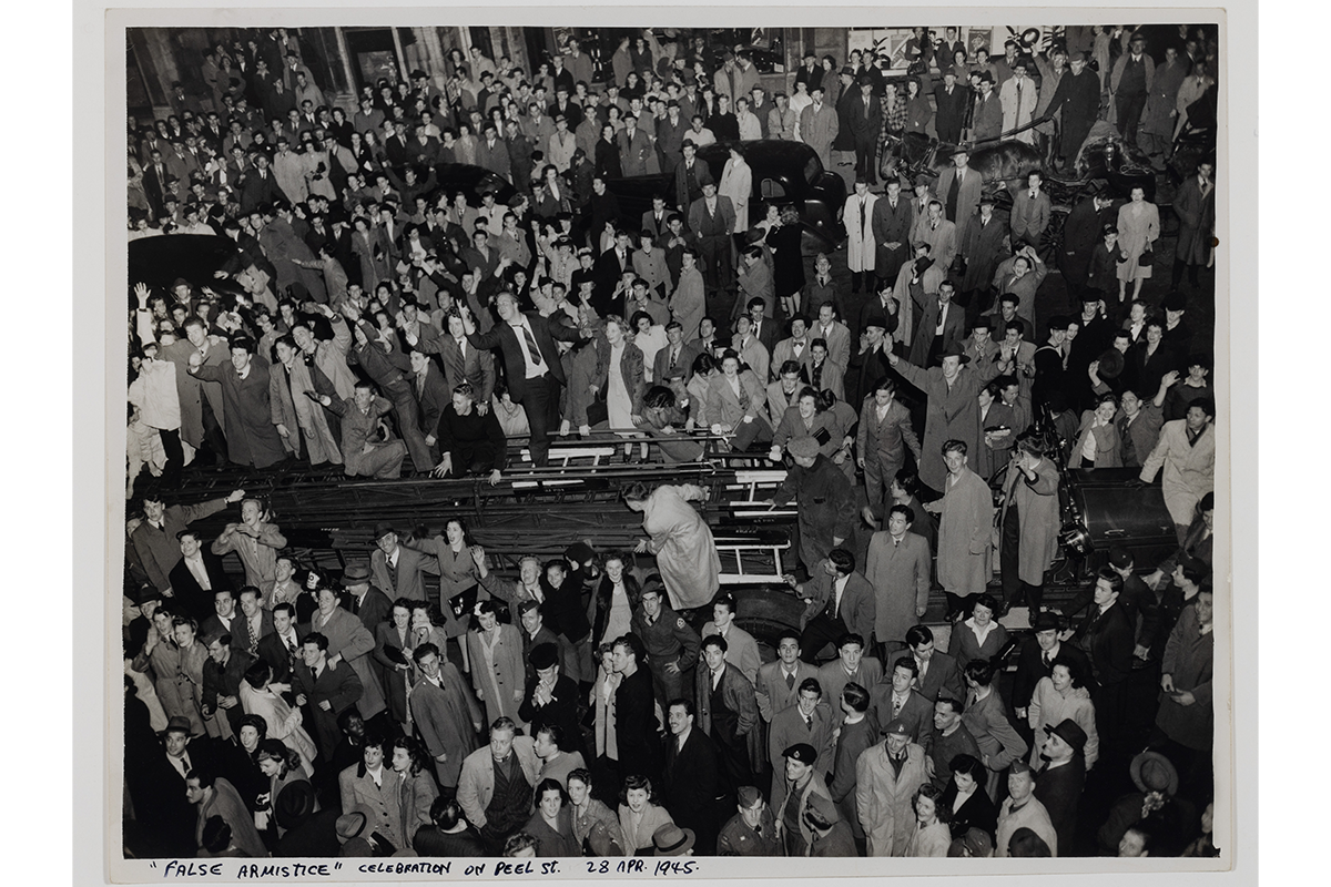 Ronald E. Fleischman, <em>“False Armistice” Celebration on Peel Street</em>, April 28, 1945, gelatin silver print, 19.2 × 24.8 cm. Gift of Ronald E. Fleischman, MP-1997.24.38, McCord Stewart Museum