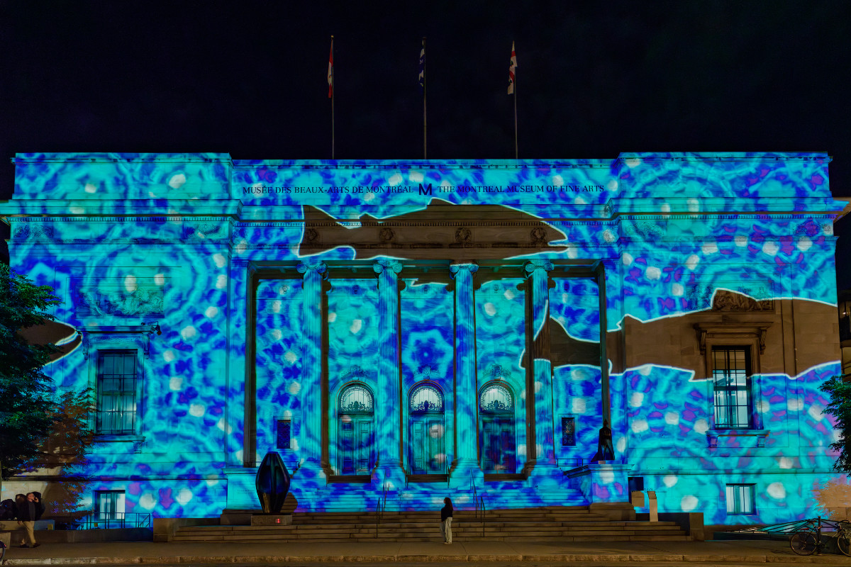 Glenn Gear (born in 1970), <em>ulitsuak | marée montante | rising tide</em>, 2024, video projected on the facade of the MMFA’s Michal and Renata Hornstein Pavilion. Photo Miguel Legault